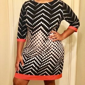 Cute black and white dress with peach accents.